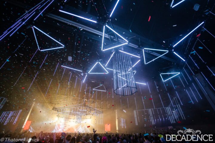 Decadence 2023: Stage production ft. floating LED lights and bright stage.