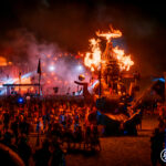Dragon sculpture breathing fire at Music Festival 2023