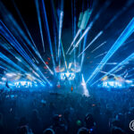 Blue LED lasers and lights above crowd at the mainstage at Music Festival 2023